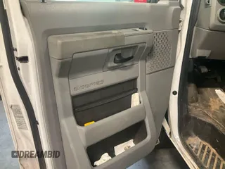 2012 Ford Econoline Cargo Commercial with VIN 1FTNE2EL4CDB14957, listed as a IAAI auction lot 42200997 with 127,924 mi miles. Bid and sale history available at carsss.com. Image 1.
