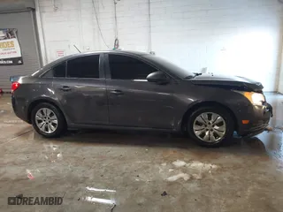 2014 Chevrolet Cruze LS with VIN 1G1PB5SH5E7460979, listed as a IAAI auction lot 41312075 with 123,580 mi miles. Bid and sale history available at carsss.com. Image 13.