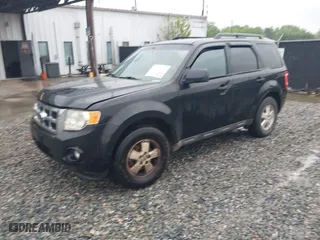 2010 Ford Escape XLT with VIN 1FMCU0DG2AKB66255, listed as a IAAI auction lot 41982329 with 192,564 mi miles. Bid and sale history available at carsss.com. Image 2.