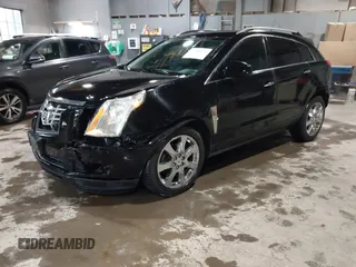 2012 Cadillac SRX Performance Collection z VIN 3GYFNEE37CS630391, wystawiony jako IAAI lot #42280516 z przebiegiem 137 330 mil mil oraz . Historia ofert i sprzedaży dostępna na DreamBid. Obrazek 17.