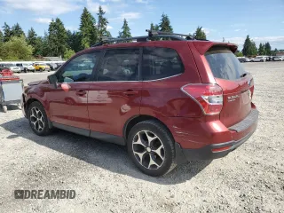2014 Subaru Forester XT Touring with VIN JF2SJGMC0EH513844, listed as a Copart auction lot 61162355 with 56,887 mi miles and Salvage title. Bid and sale history available at DreamBid. Image 2.