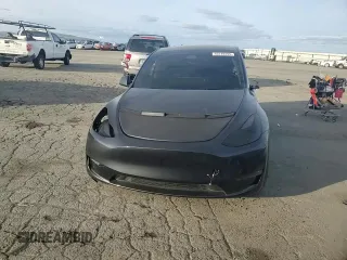 2024 Tesla Model Y Performance z VIN 7SAYGDEF3RF078535, wystawiony jako Copart lot #45749495 z przebiegiem 8 852 mil mil oraz Szkoda całkowita • Salvage title. Historia ofert i sprzedaży dostępna na DreamBid. Obrazek 11.