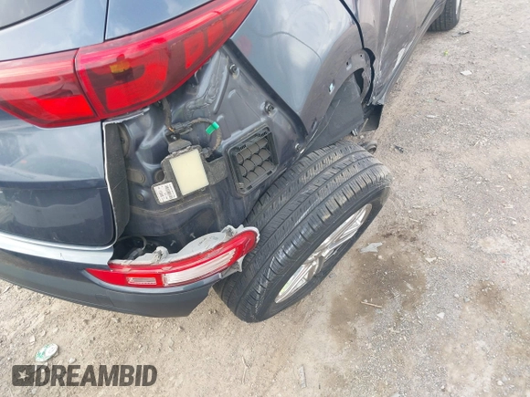 2018 Kia Sportage LX with VIN KNDPMCAC9J7363466, listed as a IAAI auction lot 41841061 with 98,154 mi miles and . Bid and sale history available at DreamBid. Image 6.