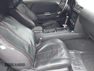 2014 Dodge Challenger R/T Plus z VIN 2C3CDYBT1EH177266, wystawiony jako IAAI lot #41798977 z przebiegiem 109 489 mil mil oraz . Historia ofert i sprzedaży dostępna na DreamBid. Obrazek 5.