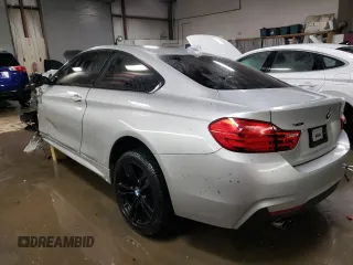 2014 BMW 4 Series 428i xDrive with VIN WBA3N5C50EK196422, listed as a Copart auction lot 82368874 with 68,079 mi miles and Salvage Title. Bid and sale history available at DreamBid. Image 2.