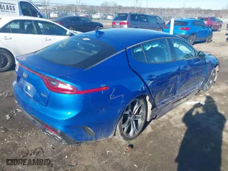 2019 Kia Stinger GT with VIN KNAE35LC3K6061517, listed as a IAAI auction lot 41394312 with 57,318 mi miles. Bid and sale history available at carsss.com. Image 4.