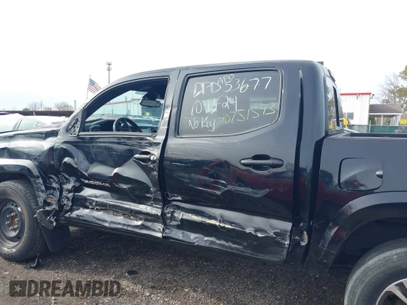 2018 Toyota Tacoma SR5 with VIN 3TMAZ5CN6JM055632, listed as a IAAI auction lot 40751593 with 125,663 mi miles and . Bid and sale history available at DreamBid. Image 15.