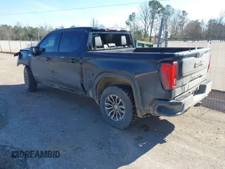 2021 GMC Sierra 1500 AT4 with VIN 1GTU9EET9MZ410854, listed as a IAAI auction lot 41307748 with 75,917 mi miles. Bid and sale history available at carsss.com. Image 3.