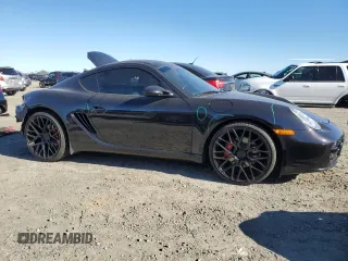 2006 Porsche Cayman S с VIN WP0AB29866U782423, выставлен на аукционе Copart как лот 87725325 с пробегом 51 686 миль миль и Списание • Salvage title. История ставок и продаж доступна на DreamBid. Изображение 4.