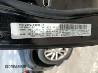 2014 Dodge Journey SXT z VIN 3C4PDCBG8ET115115, wystawiony jako Copart lot #56632555 z przebiegiem 139 785 mil mil oraz Szkoda całkowita • Salvage title. Historia ofert i sprzedaży dostępna na DreamBid. Obrazek 13.
