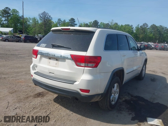 2012 Jeep Grand Cherokee Laredo with VIN 1C4RJFAG2CC176313, listed as a IAAI auction lot 42098127 with 162,556 mi miles. Bid and sale history available at carsss.com. Image 4.