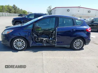 2017 Ford C-Max SE z VIN 1FADP5AU0HL115421, wystawiony jako IAAI lot #42216348 z przebiegiem 145 415 mil mil oraz . Historia ofert i sprzedaży dostępna na DreamBid. Obrazek 14.