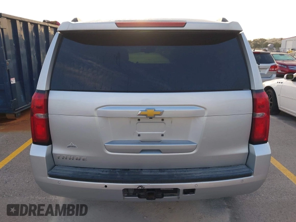 2015 Chevrolet Tahoe LT with VIN 1GNSCBKC2FR232095, listed as a IAAI auction lot 42718627 with 174,130 mi miles and . Bid and sale history available at DreamBid. Image 16.