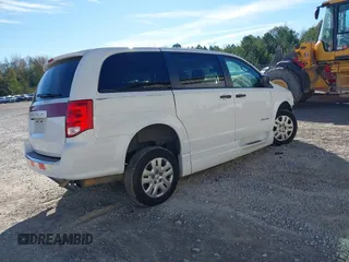 2019 Dodge Grand Caravan SE with VIN 2C7WDGBG7KR803126, listed as a IAAI auction lot 40835937 with 63,100 mi miles and . Bid and sale history available at DreamBid. Image 4.