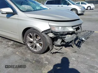 2014 Chevrolet Impala LT with VIN 2G1125S33E9256206, listed as a IAAI auction lot 41829287 with 198,661 mi miles and . Bid and sale history available at DreamBid. Image 19.