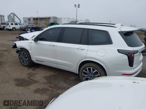 2023 Cadillac XT6 AWD Sport with VIN 1GYKPHRS1PZ155437, listed as a IAAI auction lot 41758495 with 22,949 mi miles. Bid and sale history available at carsss.com. Image 3.