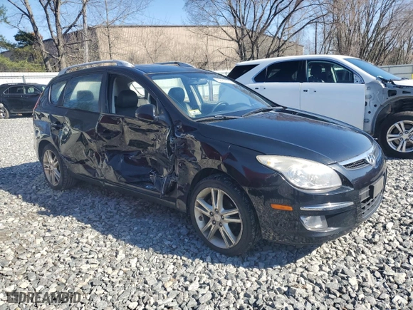 2011 Hyundai Elantra Touring SE with VIN KMHDC8AE1BU094088, listed as a Copart auction lot 52918125 with 172,912 mi miles and Clean Title. Bid and sale history available at carsss.com. Image 4.