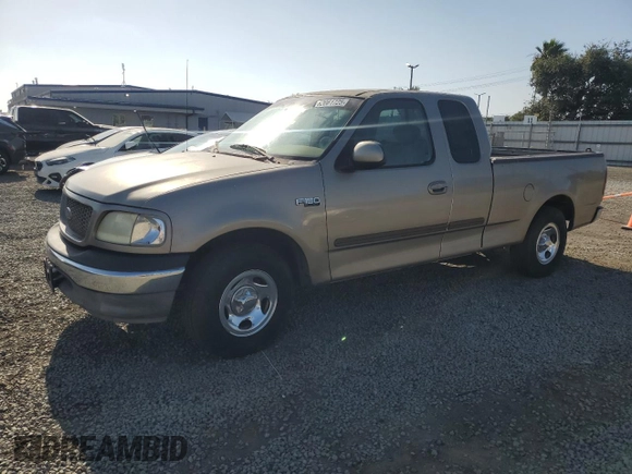 2002 Ford F-150 XL z VIN 1FTRX17232KC51909, wystawiony jako Copart lot #62081725 z przebiegiem Nie podano mil oraz Czysty tytuł • Clean title. Historia ofert i sprzedaży dostępna na DreamBid. Obrazek 1.
