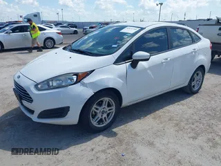 2017 Ford Fiesta SE z VIN 3FADP4BJXHM147290, wystawiony jako IAAI lot #42071340 z przebiegiem 122 142 mil mil oraz . Historia ofert i sprzedaży dostępna na DreamBid. Obrazek 2.