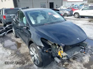 2023 Tesla Model Y Long Range z VIN 7SAYGDEE8PF826989, wystawiony jako IAAI lot #41615166 z przebiegiem 10 368 mil mil oraz . Historia ofert i sprzedaży dostępna na DreamBid. Obrazek 1.