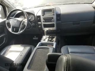2015 Nissan Titan Pro-4X with VIN 1N6BA0EC1FN507894, listed as a Copart auction lot 65784274 with 147,576 mi miles and Salvage title. Bid and sale history available at DreamBid. Image 8.