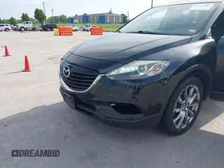 2015 Mazda CX-9 Grand Touring z VIN JM3TB2DA1F0456773, wystawiony jako IAAI lot #42257555 z przebiegiem 152 890 mil mil oraz . Historia ofert i sprzedaży dostępna na DreamBid. Obrazek 17.