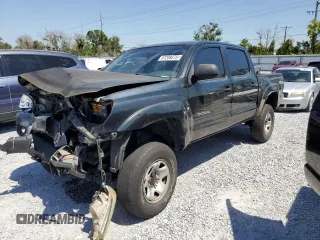 2012 Toyota Tacoma with VIN 3TMLU4EN5CM099803, listed as a Copart auction lot 57209375 with 144,466 mi miles and Salvage title. Bid and sale history available at DreamBid. Image 1.