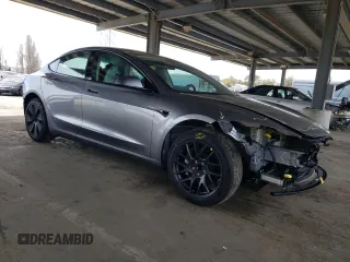 2025 Tesla Model 3 Long Range with VIN 5YJ3E1EA8SF880617, listed as a Copart auction lot 49484815 with 2,625 mi miles and Salvage Title. Bid and sale history available at DreamBid. Image 4.