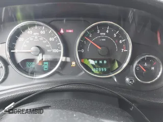 2014 Jeep Wrangler Unlimited Sport with VIN 1C4BJWDG6EL239378, listed as a IAAI auction lot 42073392 with 120,999 mi miles. Bid and sale history available at carsss.com. Image 7.