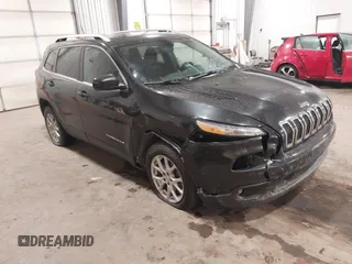 2014 Jeep Cherokee Latitude z VIN 1C4PJMCS1EW229758, wystawiony jako IAAI lot #41104147 z przebiegiem 176 129 mil mil oraz . Historia ofert i sprzedaży dostępna na DreamBid. Obrazek 1.