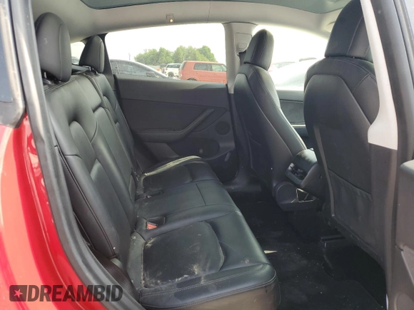 2021 Tesla Model Y Standard Range with VIN 5YJYGDED5MF116562, listed as a Copart auction lot 51211535 with 68,549 mi miles and Salvage Title. Bid and sale history available at DreamBid. Image 11.