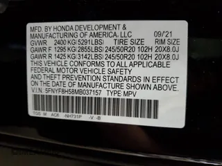 2021 Honda Passport EX-L with VIN 5FNYF8H58MB037157, listed as a Copart auction lot 58828074 with 25,890 mi miles and Salvage Title. Bid and sale history available at carsss.com. Image 14.