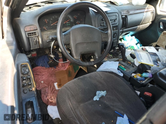2000 Jeep Grand Cherokee Laredo with VIN 1J4G248S7YC321298, listed as a Copart auction lot 58036255 with 292,779 mi miles and Salvage title. Bid and sale history available at DreamBid. Image 8.