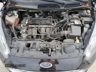 2019 Ford Fiesta SE z VIN 3FADP4BJ5KM144370, wystawiony jako Copart lot #49093915 z przebiegiem Nie podano mil oraz Szkoda całkowita • Salvage title. Historia ofert i sprzedaży dostępna na DreamBid. Obrazek 11.