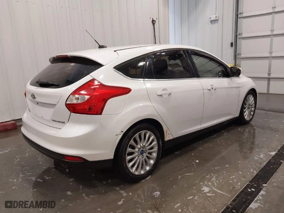 2012 Ford Focus Titanium with VIN 1FAHP3N26CL122364, listed as a IAAI auction lot 41777664 with NaN miles. Bid and sale history available at carsss.com. Image 4.