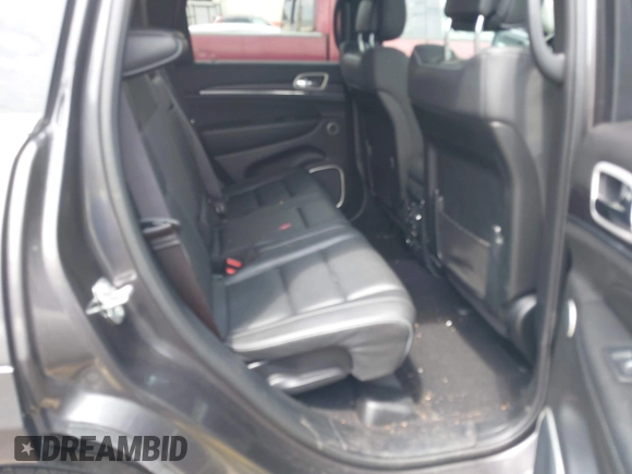 2020 Jeep Grand Cherokee Summit with VIN 1C4RJFJT0LC137054, listed as a IAAI auction lot 42235704 with 70,000 mi miles and . Bid and sale history available at DreamBid. Image 8.