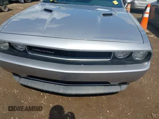2013 Dodge Challenger SXT с VIN 2C3CDYAG7DH675121, выставлен на аукционе IAAI как лот 42623166 с пробегом 189 604 миль миль и . История ставок и продаж доступна на DreamBid. Изображение 12.