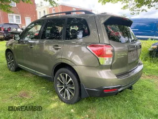 2017 Subaru Forester Touring с VIN JF2SJGWC9HH402713, выставлен на аукционе Copart как лот 63635365 с пробегом 128 906 миль миль и Чистый • Clean title. История ставок и продаж доступна на DreamBid. Изображение 3.