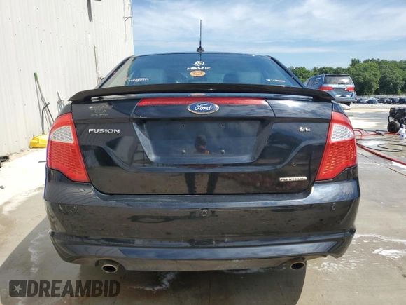 2012 Ford Fusion SE z VIN 3FAHP0HGXCR117692, wystawiony jako Copart lot #56026555 z przebiegiem 236 669 mil mil oraz Szkoda całkowita • Salvage title. Historia ofert i sprzedaży dostępna na DreamBid. Obrazek 6.