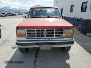 1990 Ford Bronco с VIN 1FMCU14T7LUA56022, выставлен на аукционе Copart как лот 52440415 с пробегом 57 215 миль миль и Чистый • Clean title. История ставок и продаж доступна на DreamBid. Изображение 5.