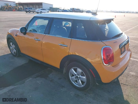 2017 MINI Hardtop 4 Door Cooper with VIN WMWXU1C58H2E17690, listed as a IAAI auction lot 41310470 with 62821 miles. Bid and sale history available at carsss.com. Image 3.
