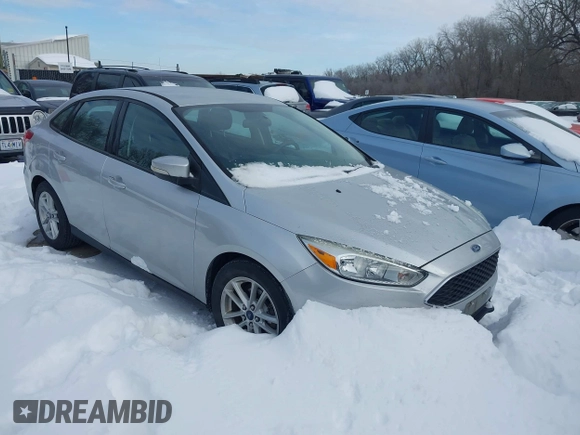 2015 Ford Focus SE z VIN 1FADP3F26FL357140, wystawiony jako IAAI lot #41256854 z przebiegiem 194 812 mil mil oraz . Historia ofert i sprzedaży dostępna na DreamBid. Obrazek 1.