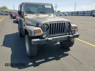 2003 Jeep Wrangler Sport z VIN 1J4FA49S43P327283, wystawiony jako Copart lot #59036295 z przebiegiem 158 108 mil mil oraz Szkoda całkowita • Salvage title. Historia ofert i sprzedaży dostępna na DreamBid. Obrazek 13.