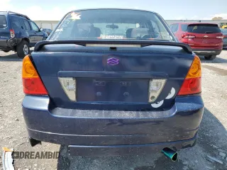 2002 Suzuki Aerio S z VIN JS2RA41S225109275, wystawiony jako Copart lot #52689585 z przebiegiem 195 612 mil mil oraz Tytuł czysty. Historia ofert i sprzedaży dostępna na DreamBid. Obrazek 6.