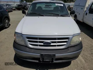 1997 Ford F-150 z VIN 1FTDF1722VKA23000, wystawiony jako Copart lot #59221975 z przebiegiem 182 352 mil mil oraz Czysty tytuł • Clean title. Historia ofert i sprzedaży dostępna na DreamBid. Obrazek 5.