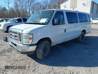2011 Ford Econoline Passenger XL with VIN 1FBSS3BL3BDA90014, listed as a IAAI auction lot 42027627 with 283,242 mi miles and . Bid and sale history available at DreamBid. Image 2.