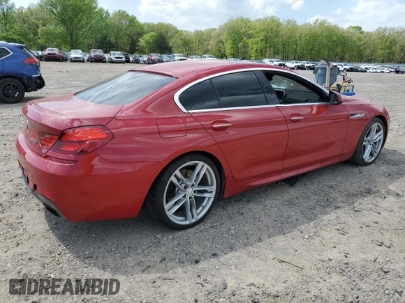 2013 BMW 6 Series 650i with VIN WBA6B2C59DDG66702, listed as a Copart auction lot 52327905 with 112,300 mi miles and Salvage Title. Bid and sale history available at DreamBid. Image 3.