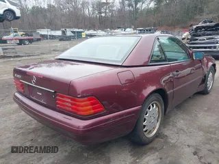 1997 Mercedes-Benz SL-Class with VIN WDBFA67F3VF142320, listed as a IAAI auction lot 41835593 with 172,151 mi miles. Bid and sale history available at carsss.com. Image 4.
