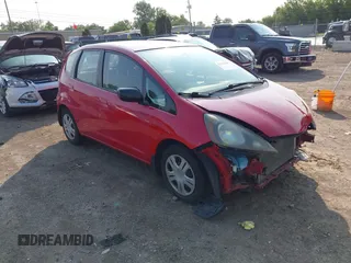 2009 Honda Fit z VIN JHMGE88219S023503, wystawiony jako IAAI lot #42376165 z przebiegiem 142 166 mil mil oraz . Historia ofert i sprzedaży dostępna na DreamBid. Obrazek 1.