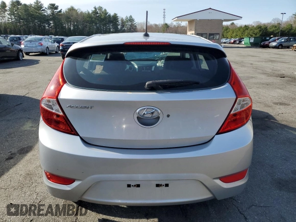 2012 Hyundai Accent SE z VIN KMHCU5AE2CU010532, wystawiony jako Copart lot #49165705 z przebiegiem Nie podano mil oraz Szkoda całkowita • Salvage title. Historia ofert i sprzedaży dostępna na DreamBid. Obrazek 6.